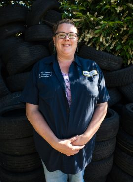 staff in front of tires